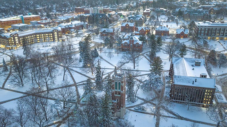 Aerial view of Michigan State University at sunrise after a heavy snow